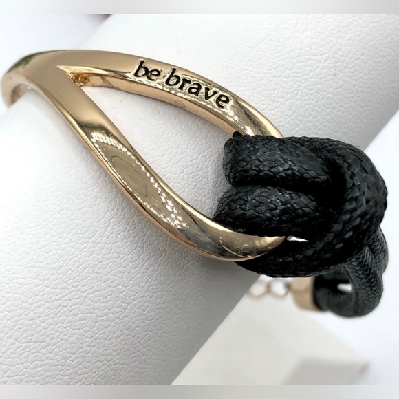 New in package Be Brave Gold Tone And Black
Knot Bracelet - Picture 5 of 6